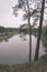 scenic wetlands with country lake or river in winter - vintage r
