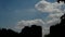 Scenic white cumulus clouds in city