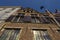 Scenic wide-angle view of the ancient brick wall of Rubens House against blue sky