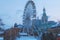 Scenic winter landscape of city Kyiv. View of the Ferris wheel on Kontraktova Square Square of Contracts