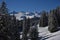 Scenic winter landscape with a mountain range covered in snow in Zurich, Switzerland