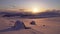 Scenic Winter Sunset over Norwegian mountains, Krutvatnet lake, view from mount Atoklimpen, Lapland, Sweden. Beautiful golden,