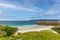 A scenics beautiful view of the Ceannabeinne Beach along the A838 touristic road near Durness in the Scottish Highland under a