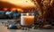 Scented Candle Burning Serenely with Dry Flowers and Smooth Pebbles Set on a Beige Table, Evoking a Sense of Calm and Mindfulness