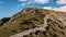 Schafbergbahn Cog Railway running from St. Wolfgang up the Schafberg, Austria.Journey to the top of Alps through lush fields and