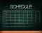 Schedule on chalkboard