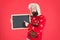 Schedule timing concept. Bearded man blank blackboard copy space. Guy santa claus red background. Chalkboard for