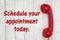 Schedule your appointment today text with retro red phone handset