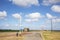 Schiermonnikoog Island, corner in the road to the ferry, low horizon and beautiful cloudy sky