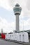 Schiphol airport control tower with I am Amsterdam sign