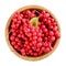 Schisandra chinensis or five-flavor berry. Fresh red ripe berries in wooden bowl isolated on white background. Top view