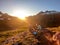 Schladming - Couple cooking dinner in the wilderness during the sunset