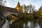 Schlayer Tower Schlayerturm with bridge Kettensteg over river Pegnitz in Nuremberg, Bavaria, Germany. October 2014