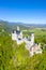 Schloss Neuschwanstein castle aerial view architecture Alps landscape Bavaria Germany travel portrait format