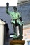 Schneeberg, Germany - March 31, 2024: Bergmannsbrunnen fountain with sculpture of a miner in central Schneeberg, a historical