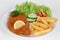 Schnitzel meal with french fries, salad and lemon
