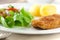 Schnitzel with potatoes and salad