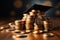 Scholarship dreams, graduation hat with coins on white backdrop