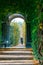 Schonbrunn Palace in Vienna, romantic garden walkway forming a green tunnel of acacias in Vienn