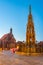 Schoner Brunnen and Frauenkirche in German town Nurnberg during