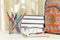 School backpack with school supplies. Books, metal stand for pen