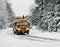 School Bus Driving Down A Snow Covered Rural Road - 2