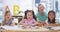 School, children and girl students drawing together in their books by table in the classroom. Education, diversity and