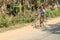 School children riding home in Cambodia,