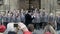 School choir singing Christmas carols in front of Bath Abbey B