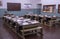 School class. Antique desks with textbooks and notebooks.