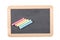 School concept: close up on a slate blackboard with chalks isolated on white background and clipping path