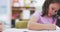 School, education and girl students drawing in their books by a desk in an art classroom. Knowledge, learning and