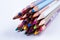 School equipment: colored pencils in a tight bunch; all colors