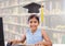 School girl in education library with graduation hat