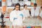 School girl experimenting with chemical in laboratory at school