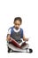 School girl sitting reading book