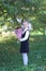 School girl in a uniform with bouquet of flowers. Back to school