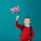 School Holidays in Great Britain. Little schoolboy with national