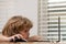 School kid doing homework. Pupil gets ready for school. Portrait of child at school at class workplace.