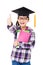 school kid in graduation cap with thumb up