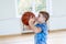 School kid playing basketball in a physical education lesson. Horizontal education poster, greeting cards, headers, website. Safe