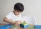 School kid using plastic block counting number,Child boy studying math by colour stack box,Montessori classroom material for