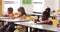 School kids studying in classroom