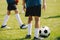 School Kids Training Football on Pitch  Group of Young School Age Boys On Training Session With Youth Coach