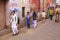 School kids walking in the street in Taj Ganj neighborhood of Ag