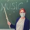 School music teacher in a medical mask. Woman teaches playing musical instruments during quarantine