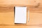 School notepad and pen on the wooden desk. spiral notepad on a tableschool notepad and pen on the wooden desk. spiral notepad on a