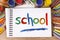 School painted on sketch pad, art and craft equipment, back to school concept