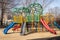 school playground with monkey bars, slides, and climbing ropes for active play