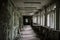 School room with turned chairs and opened window frames in Pripyat